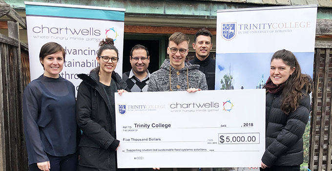 Trinity students and Assistant Provost Dr. Jonathan Steels receive Chartwells Campus Project prize
