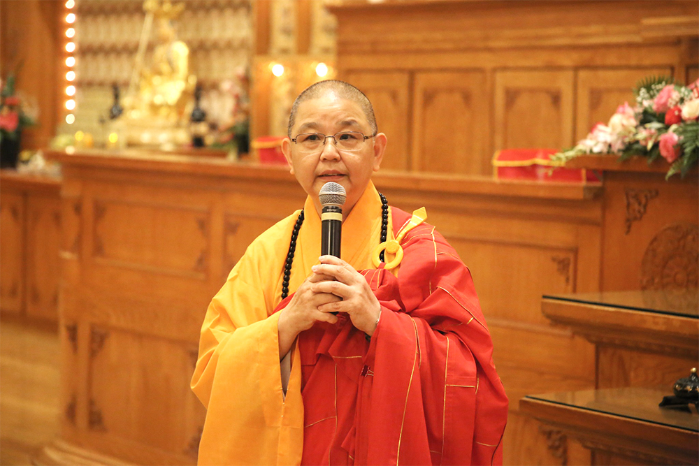 Buddhist monk giving lecture