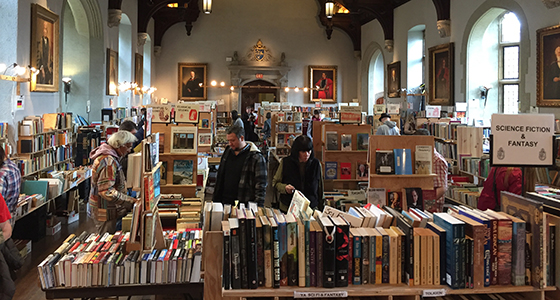 Shoppers looking at books at the Book Sale in Seeley Hall