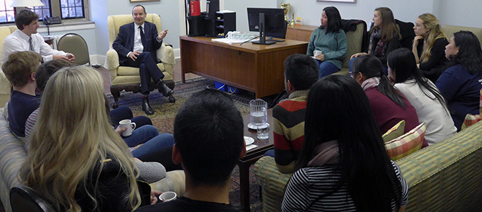 Philippe Sands talks with Trinity One students at a fireside chat