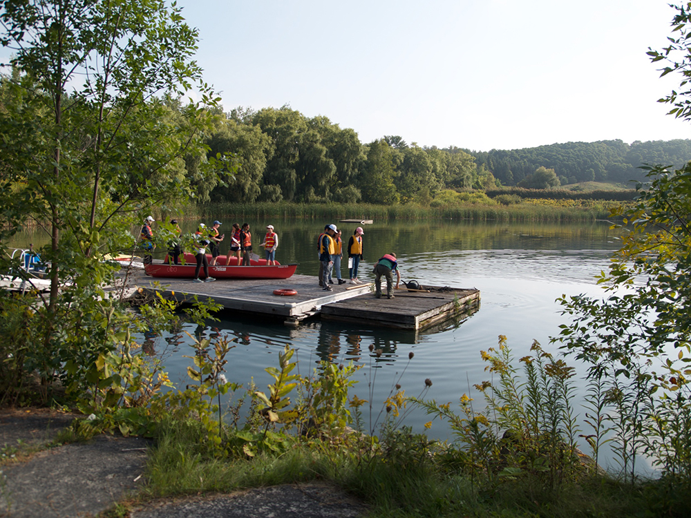 Trinity One field trip to U of T’s Koffler Scientific Reserve: students gather on a dock