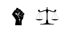 a raised fist and a scale