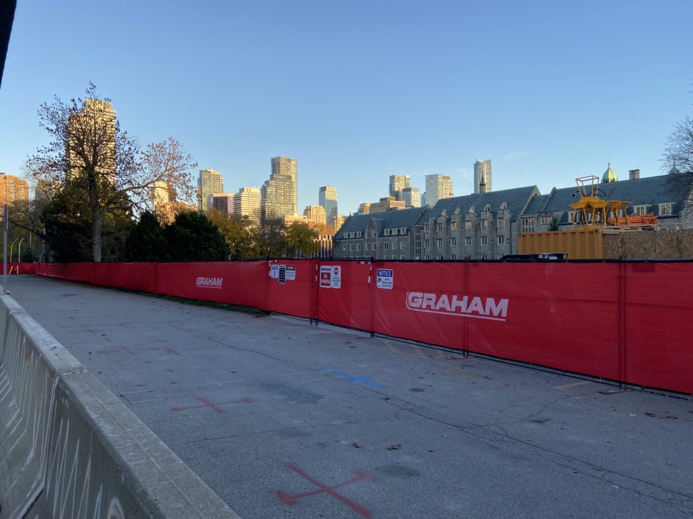 Construction site: fenced enclosure along Varsity Centre laneway, November 8, 2022